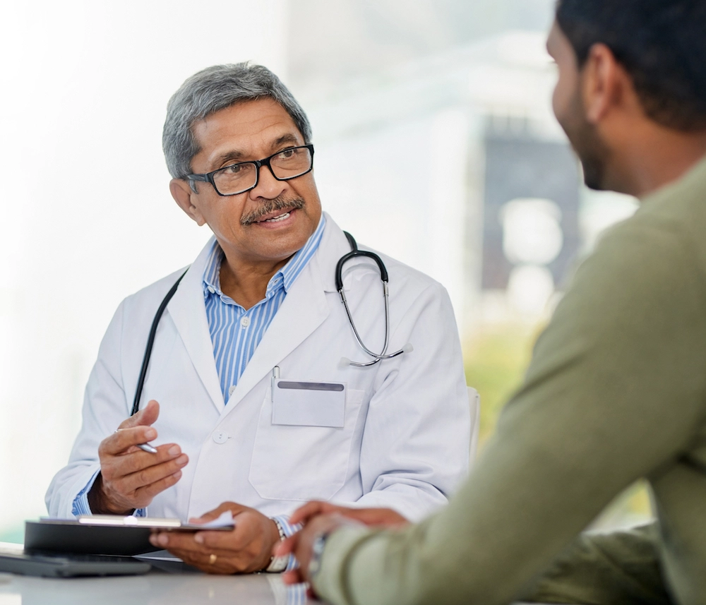 Male Included Health doctor talking to a patient